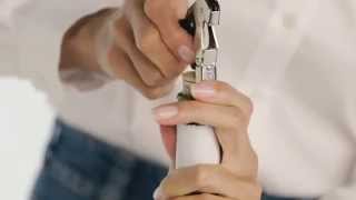 How to Uncork a Wine Bottle  Cooking Tutorial  InStyle [upl. by Edecrem]