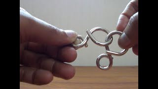 Solution to 8 shaped Metal Ring puzzle [upl. by Negriv]